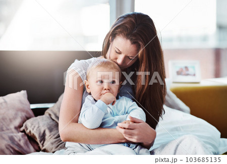 Baby, mother and hug in bed with love or bedroom, peace in morning and newborn together, relax and calm mom in home. Postpartum, boy and quality time with mama to enjoy, support or care for child Baby, mother and hug in bed with love or bedroom, peace in morning and newborn together, relax and calm mom in home. Postpartum, boy and quality time with mama to enjoy, support or care for child 103685135
