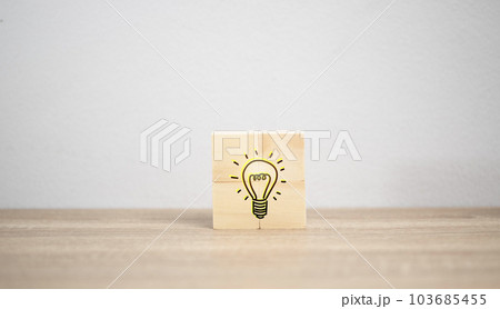 business idea concept. Light bulb, red arrow and many icon on wooden board. Icon Business success and new strategy. Industry. Medicine, engineer. Financial. business idea concept. Light bulb, red arrow and many icon on wooden board. Icon Business success and new strategy. Industry. Medicine, engineer. Financial. 103685455