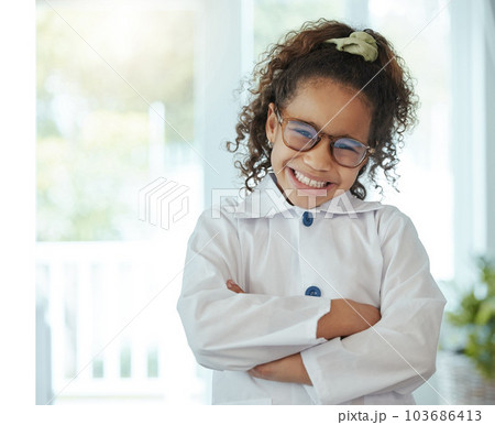 Look at that smile. an adorable little girl wearing glasses. Look at that smile. an adorable little girl wearing glasses. 103686413