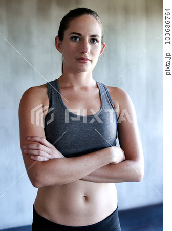Workout, arms crossed and portrait of woman confident after health club exercise, fitness studio performance or gym training. Athlete lifestyle, motivation and healthy female person with confidence Workout, arms crossed and portrait of woman confident after health club exercise, fitness studio performance or gym training. Athlete lifestyle, motivation and healthy female person with confidence 103686764
