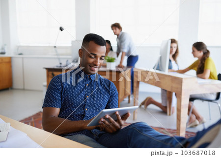 Relax, architect or black man with tablet in office for engineering project or social media online. Research, digital or relaxed designer typing on web app for internet, database or architecture info 103687018