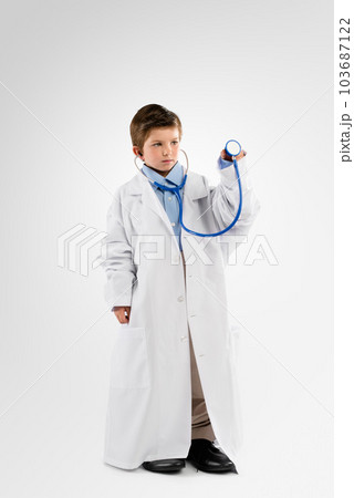 I want to help people when Im big. Studio shot of an adorable little boy dressing up as a doctor. I want to help people when Im big. Studio shot of an adorable little boy dressing up as a doctor. 103687122