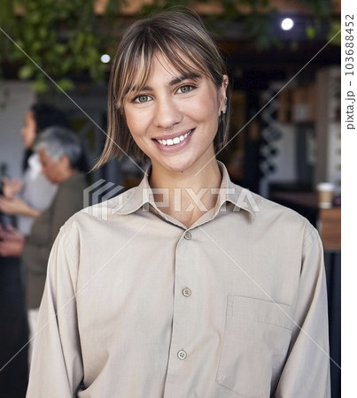 Portrait, happy and professional with a business woman intern standing in the office for coaching or development. Smile, workshop and confidence with an attractive young female employee at work 103688452
