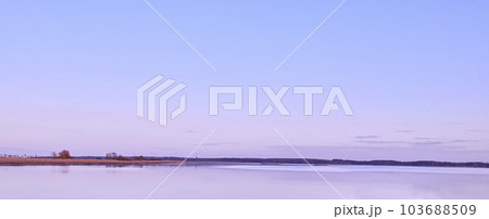 Copy space, sea and ocean view with purple sky over calm, serene and peaceful beach. Landscape of relaxing, tropical and remote seascape on a coastal island. Summer vacation and holiday destination Copy space, sea and ocean view with purple sky over calm, serene and peaceful beach. Landscape of relaxing, tropical and remote seascape on a coastal island. Summer vacation and holiday destination 103688509