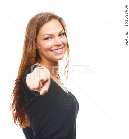 Confidence is a beautiful feature in a woman. Studio shot of a beautiful young woman pointing at the camera. Confidence is a beautiful feature in a woman. Studio shot of a beautiful young woman pointing at the camera. 103688696