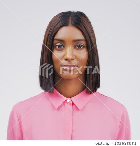 Portrait of real Indian woman, white background and positive mindset in university profile picture of student. Focus, opportunity and education, face of young college girl isolated on studio backdrop 103688981