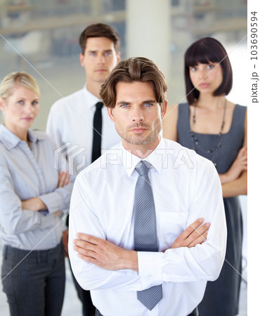 Portrait, confident people with serious face and arms crossed in business office. Teamwork or collaboration, coworkers or colleagues in corporate environment and professional leadership or management 103690594