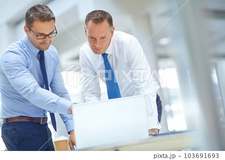 Planning, laptop and business people teamwork, collaboration or strategy for company website design. Corporate businessman, person and management partner for review ideas, about us or faq information Planning, laptop and business people teamwork, collaboration or strategy for company website design. Corporate businessman, person and management partner for review ideas, about us or faq information 103691693