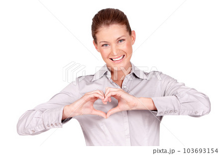 Love, kindness and portrait of woman doing heart sign, shape or gesture with hands isolated in a white studio background. Hope, casual and female employee with happiness, care and happy signal 103693154