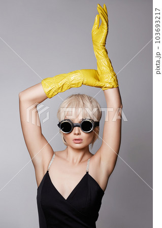 beautiful blond hair woman in gloves and sunglasses beautiful blond hair woman in gloves and sunglasses 103693217