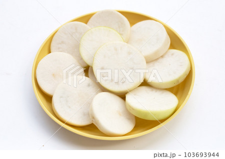 Sliced Japanese daikon. Fresh vegetables 103693944