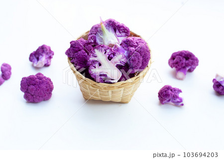 Purple cauliflower on white background. Purple cauliflower on white background. 103694203