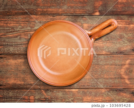 Brown handled bowl Brown handled bowl 103695428