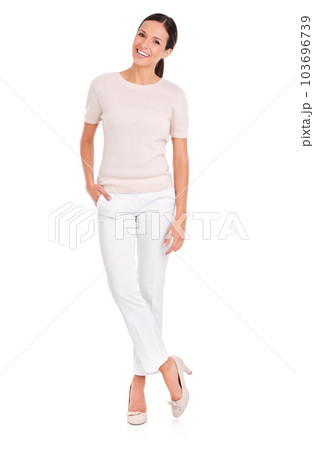 Shes everybodys woman. Studio shot of a casually dressed young woman isolated on white. Shes everybodys woman. Studio shot of a casually dressed young woman isolated on white. 103696739