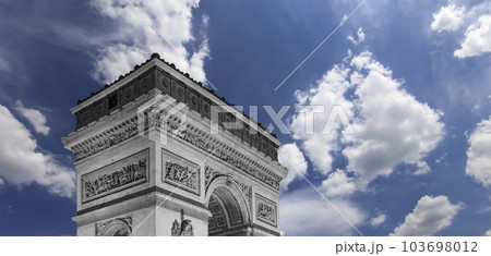 Arc de Triomphe (against the background of sky with clouds), Paris, France. The walls of the arch are engraved with the names of 128 battles and names of 660 French military leaders (in French) Arc de Triomphe (against the background of sky with clouds), Paris, France. The walls of the arch are engraved with the names of 128 battles and names of 660 French military leaders (in French) 103698012