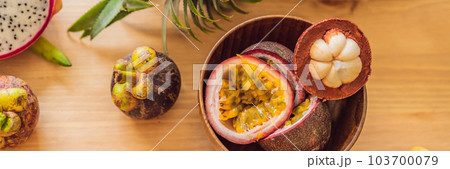 Healthy eating background of different fruits on old wooden table BANNER, LONG FORMAT Healthy eating background of different fruits on old wooden table BANNER, LONG FORMAT 103700079