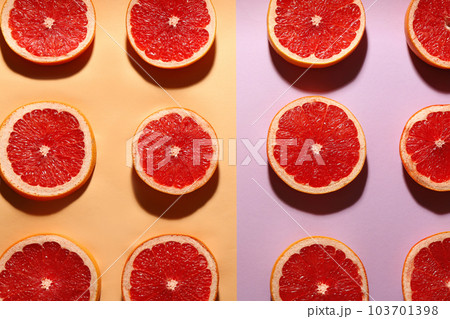 Flat lay composition with tasty ripe grapefruit slices on color background 103701398