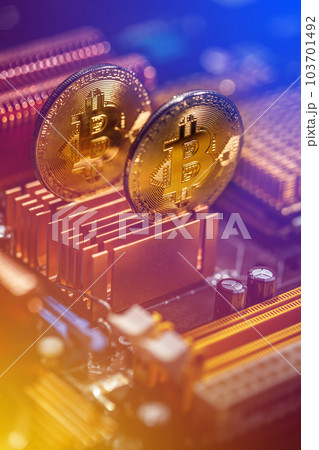 Cryptocurrency Bitcoin On The Motherboard 103701492