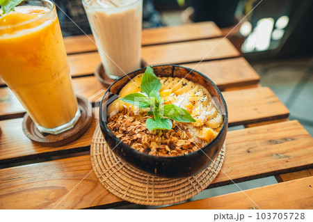 Smoothie Bowl in Coconut Shell Smoothie Bowl in Coconut Shell 103705728