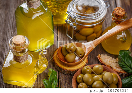 Olive oil and olive berries 103708314