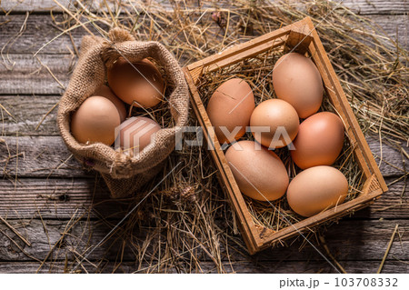 Fresh brown eggs 103708332