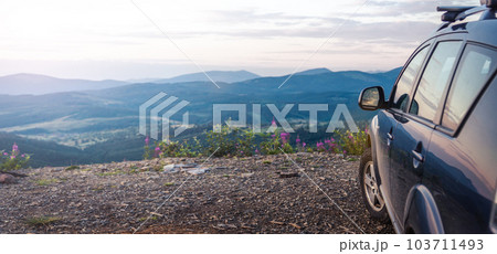 car for traveling with a mountain road 103711493