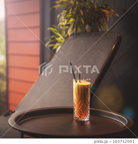 Orange cocktail at the table in the spa hotel Orange cocktail at the table in the spa hotel 103712001