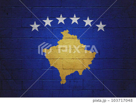 Flag of Kosovo painted on a wall Flag of Kosovo painted on a wall 103717048