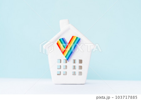 Ceramic house statuette with LGBTQ heart. Friendly home love acceptance family all gender are welcome. growth up with happy pride and freedom in the community. Rainbow flag house concept Ceramic house statuette with LGBTQ heart. Friendly home love acceptance family all gender are welcome. growth up with happy pride and freedom in the community. Rainbow flag house concept 103717885