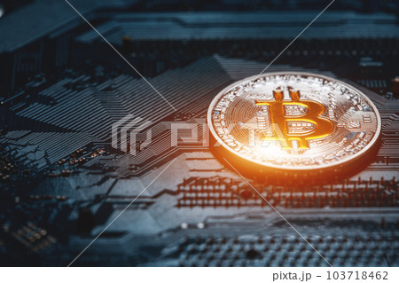 golden bitcoin cryptocurrency coin on electronic chip background golden bitcoin cryptocurrency coin on electronic chip background 103718462