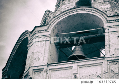 Bell in an old bell tower. Vintage film effect added 103719765