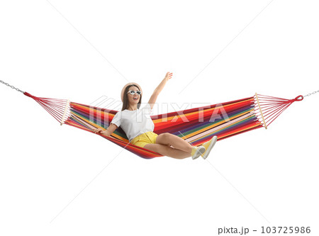 Woman resting in hammock on white background 103725986