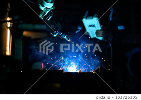 Metal welder specialist working with arc welding machine Metal welder specialist working with arc welding machine 103726305