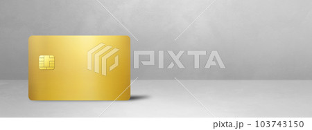 Gold credit card on a white concrete background Gold credit card on a white concrete background 103743150