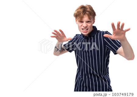 emotional 25s blond man with tattoos grimacing emotional 25s blond man with tattoos grimacing 103749179