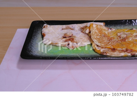 大阪名物の阪神百貨店のイカ焼き 大阪名物の阪神百貨店のイカ焼き 103749782