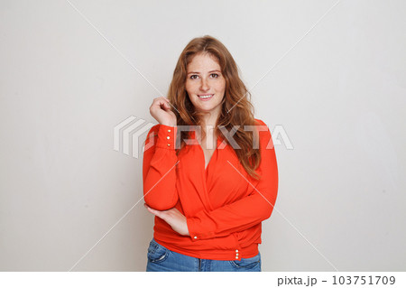 Cheerful woman looking at camera portrait 103751709