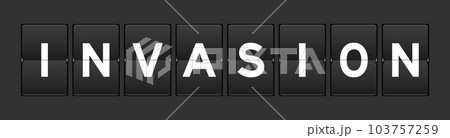 Black color analog flip board with word invasion on gray background Black color analog flip board with word invasion on gray background 103757259