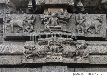 Carved sculptures of Hindu God and Goddess on the Bugga Rmalingeswara Temple, Tadipatri, Andhra Pradesh, India. 103757572