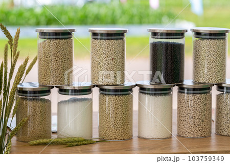 Chemical fertilizers in glass jars on a blurred background 103759349