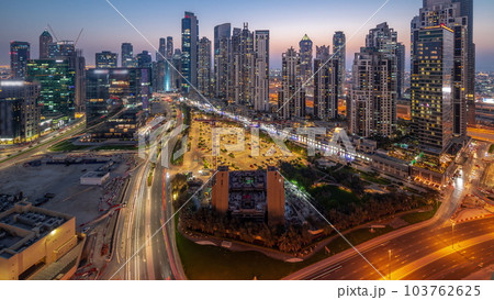 Bay Avenue with modern towers residential development in Business Bay aerial panoramic day to night timelapse, Dubai 103762625