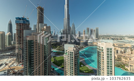 Panorama showing Dubai Downtown cityscape with tallest skyscrapers around aerial timelapse. 103762635