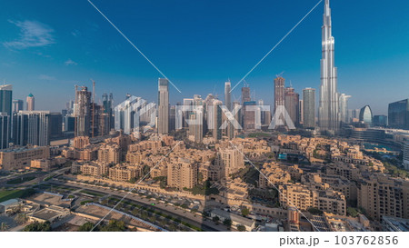 Dubai Downtown morning timelapse with tallest skyscraper and other towers Dubai Downtown morning timelapse with tallest skyscraper and other towers 103762856