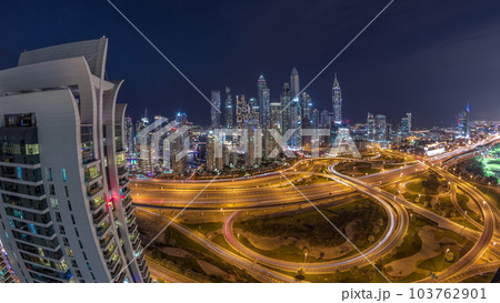 Dubai Marina highway intersection spaghetti junction day to night timelapse Dubai Marina highway intersection spaghetti junction day to night timelapse 103762901