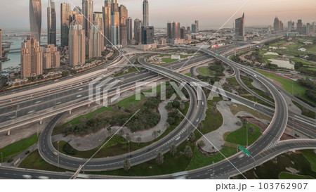 Dubai Marina highway intersection spaghetti junction night to day timelapse Dubai Marina highway intersection spaghetti junction night to day timelapse 103762907