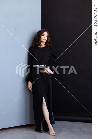 Attractive woman with long brunette hair 103764357