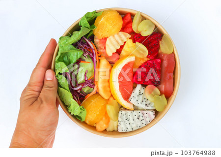 fruit and vegetable salad or orange, dragon fruit and lettuce salad 103764988