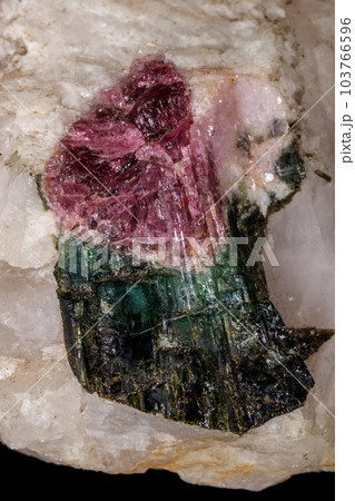 macro mineral tourmaline stone on black background 103766596
