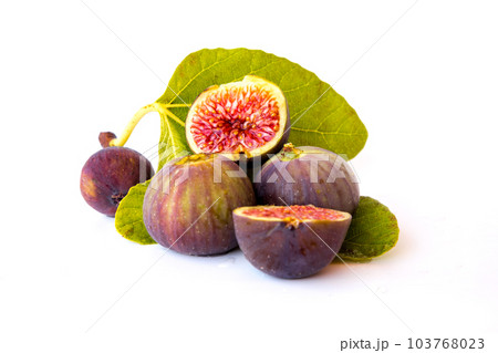 Fig isolated on white background. Fig macro. Fresh fruits with leaf isolated on white background Fig isolated on white background. Fig macro. Fresh fruits with leaf isolated on white background 103768023