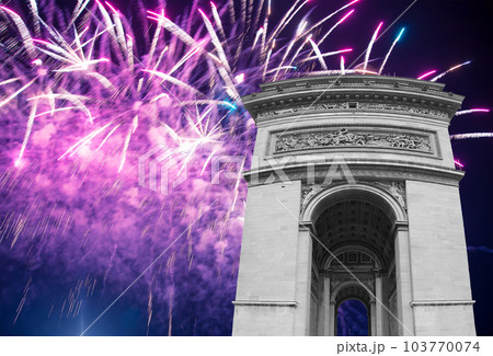 Celebratory colorful fireworks over the Arc de Triomphe, Paris, France 103770074